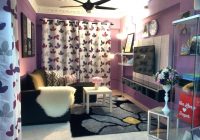 Hiasan dalaman ruang tamu dengan tema ungu – kabinet tv tu memang cantik